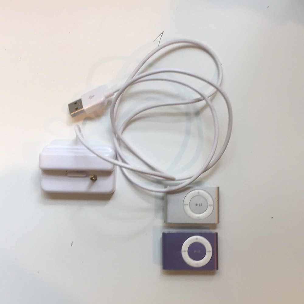 2 iPod Shuffle’s and charger!